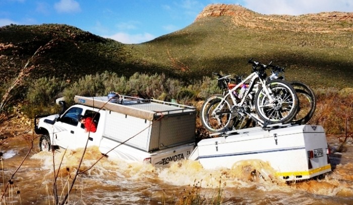 Guests crossing the Elandskloof River after some heavy rains